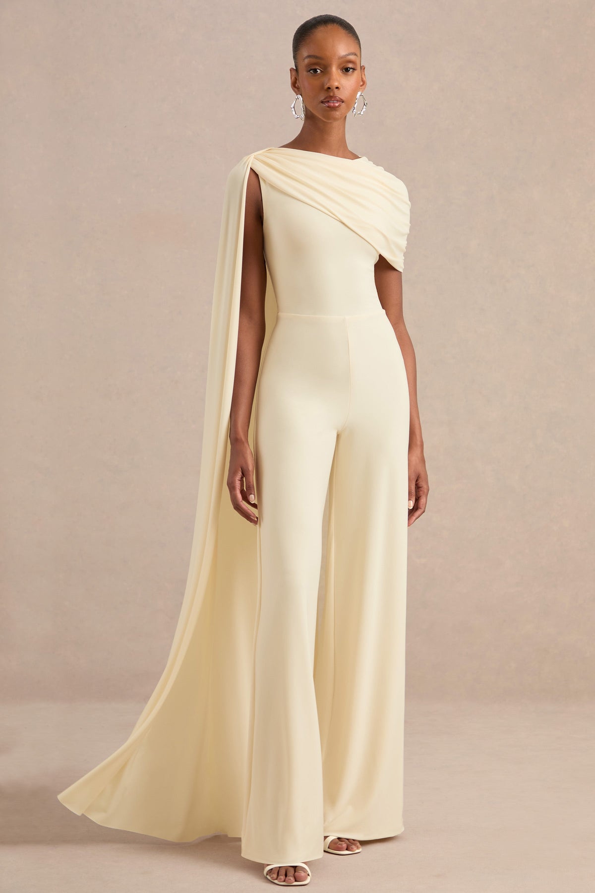 Emelisse | Cream Jersey Round Neck Jumpsuit With Draped Detailing And Cape Sleeve